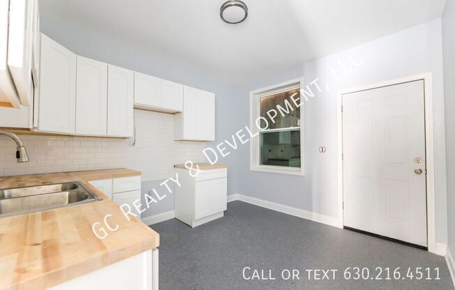 6433 S VERNON AVE