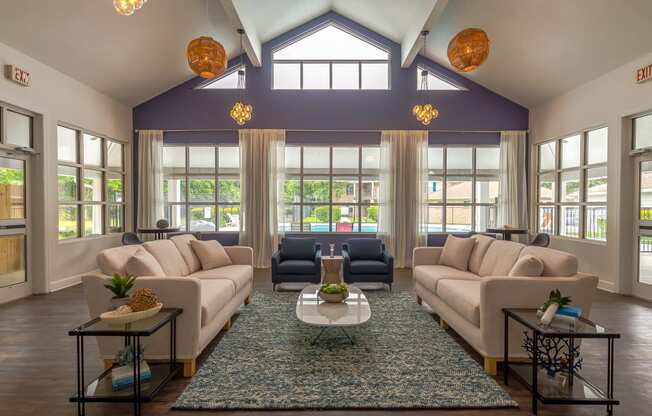a living room with two couches and a coffee table