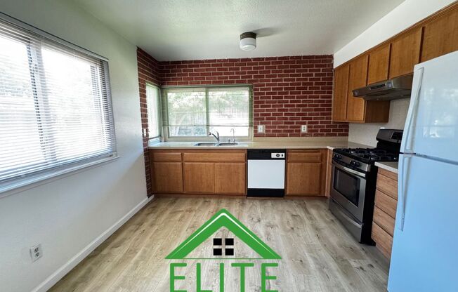 **Spacious 5-Bedroom Home with Modern Upgrades and Private Backyard Available Now**