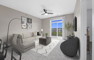 A modern living room with a grey sofa, a black chair, and a 9 foot ceiling at Trade Winds Apartment Homes, Elkhorn, Nebraska