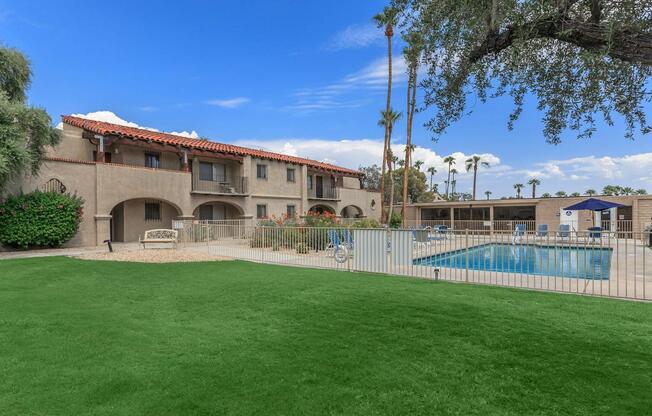 a large lawn in front of a building