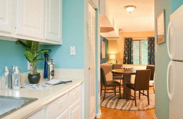 White kitchen at Emory Woods Apartments, Durham, NC, 28205.