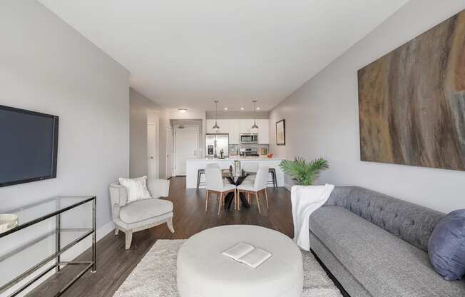 a living room with a couch and a table at Barrington 101, Barrington, IL