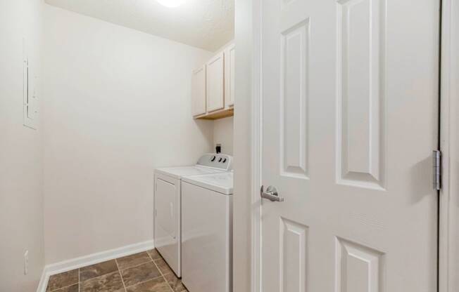 Laundry Room with Full-Size Washer/Dryer