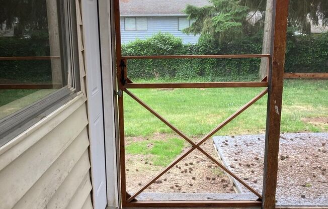 Cozy 4-Bedroom 1.5 Bath Gem with Fenced Yard & Playhouse Fun