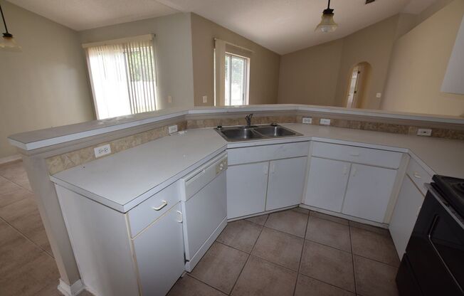 4 Bedroom, 2 Bath Single Family Home at 1060 Dudley Drive, Kissimmee, FL 34758.