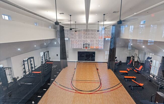 Expansive fitness center with basketball court