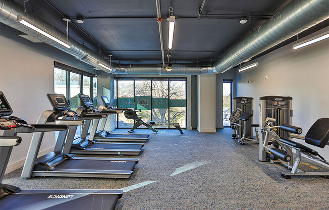 Cardio Machines In Gym at Link Apartments® Montford, Charlotte