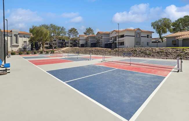 Community Pickleball Courts with Nets at Hilands Apartments in Tucson, AZ.