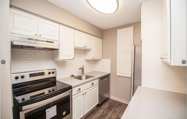 Long Realty & Property Management - 2 Bedroom Condo in Access Controlled Building