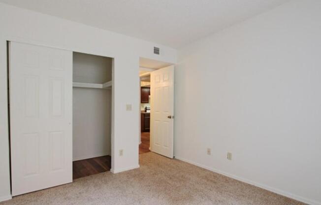 a large white refrigerator in a kitchen