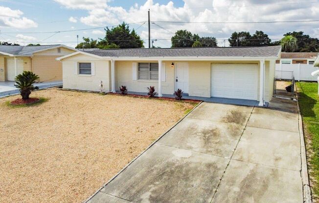 Just Reduced!!  Completely updated 3/1.5/1 1231 Sq. Ft. with UPDATED kitchen with GRANITE, UPDATED bathroom, LARGE living space!!!!