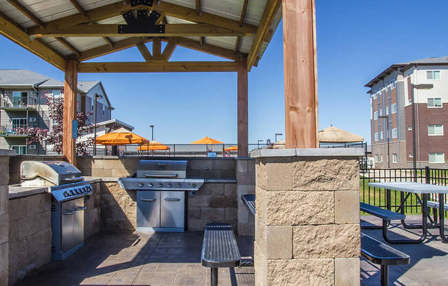 our apartments showcase a beautiful covered outdoor kitchen