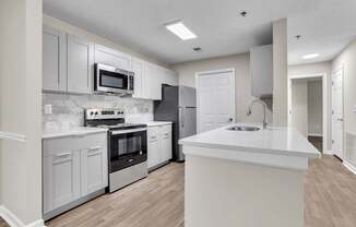 Kitchen with stainless steel appliances