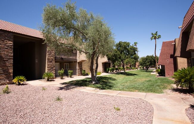 First floor unit in guard gated SW community with pool, spa, exercise room, tennis