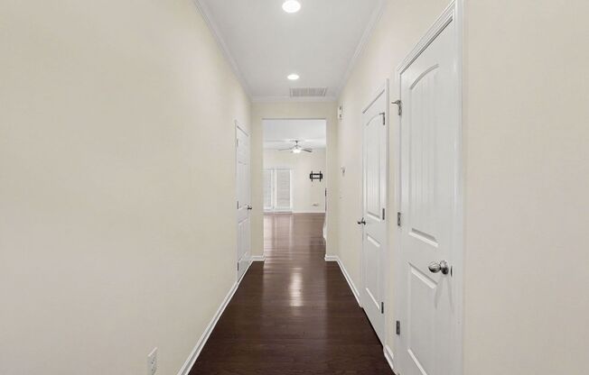 Welcome home! This pristine, end-unit townhome combines modern comfort, thoughtful upgrades, and low-maintenance living in an unbeatable Holly Springs location.