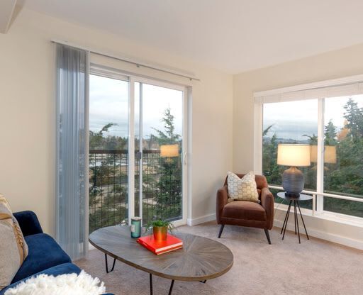 a living room with a couch and a chair