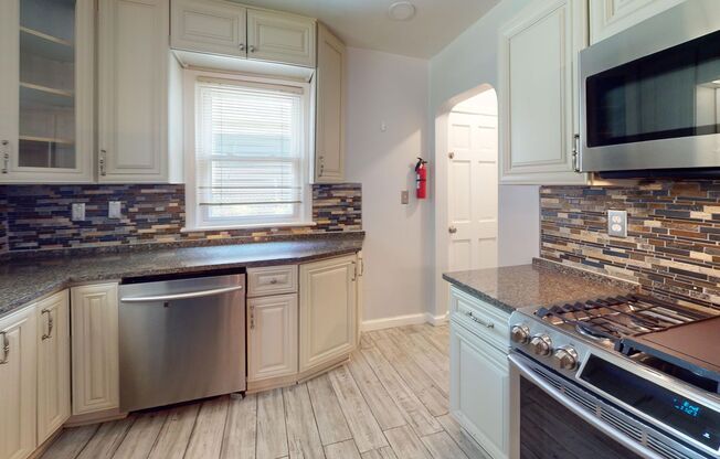 Spacious Three Bedroom Silver Spring House! Massive Backyard & Updated Kitchen!