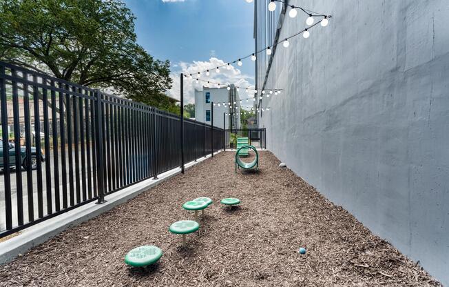 A dedicated pet run offers a convenient space for play and fresh air, thoughtfully designed for four-legged companions in the heart of Atlanta.