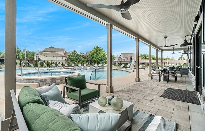 Patio Area Overlooking The Pool & Sundeck