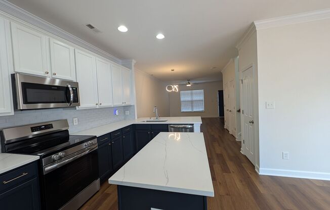 Pristine End Unit Townhome located in the Prosperity Place community!