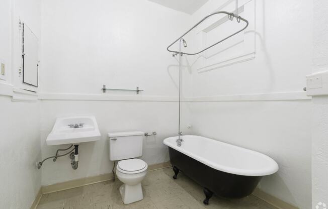 a bathroom with a sink toilet and a bath tub at Clay & Tiffany, Portland, OR, 97201