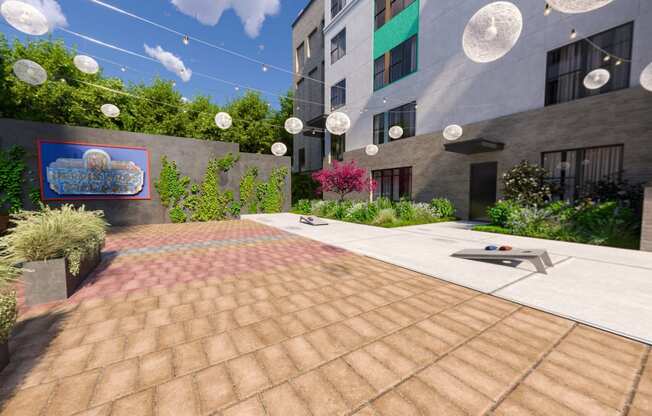 a courtyard with a pool and a building with trees