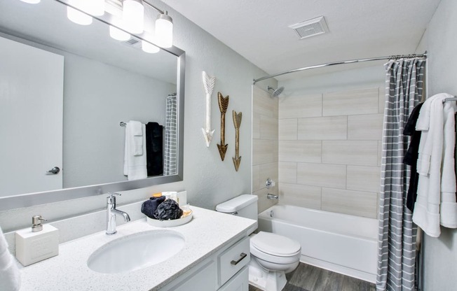 our apartments offer a bathroom with a bathtubat The Julia, Mesa, AZ