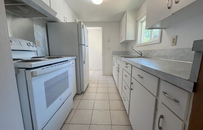 Charming 2-Bedroom Home with Open Living Space and Tile Flooring