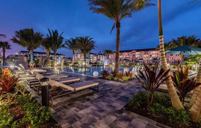 View of Tropical Courtyard at Night at Edge75, Naples, FL