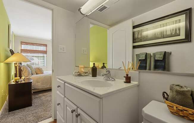 a bathroom with a sink and a mirror, Kenilworth at Charles, Towson MD