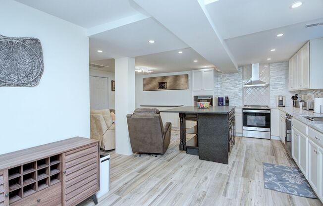 Discover the charm of this FULLY FURNISHED basement unit, tucked away in a beautifully updated bungalow in the heart of the historic Cherry neighborhood