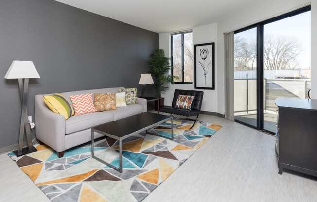 Spacious living room with neutral walls and ample natural light.