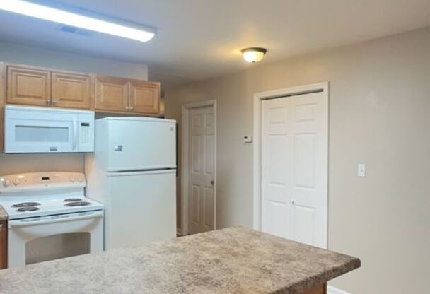 Bright, roomy unit available August 01st!  Convenient location at a great price - $3150/month includes 2 assigned Parking Spaces!
