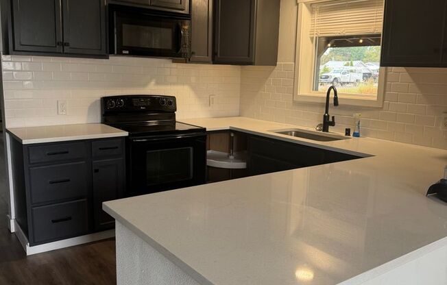 3 bedroom home with porch and shop!!