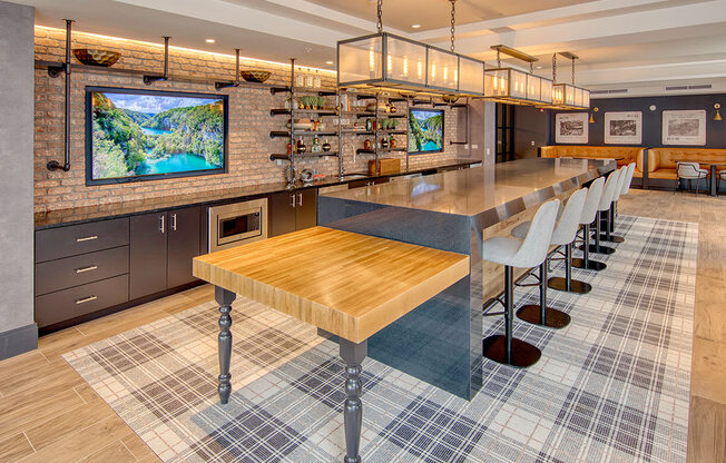 Eat-In Table With High Chairs In Clubhouse at One Harrison, Harrison