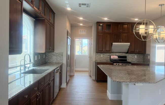 newer3-story home in southwest with Solar panel and EV car charger