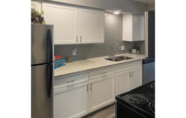 a stainless steel refrigerator in a kitchen