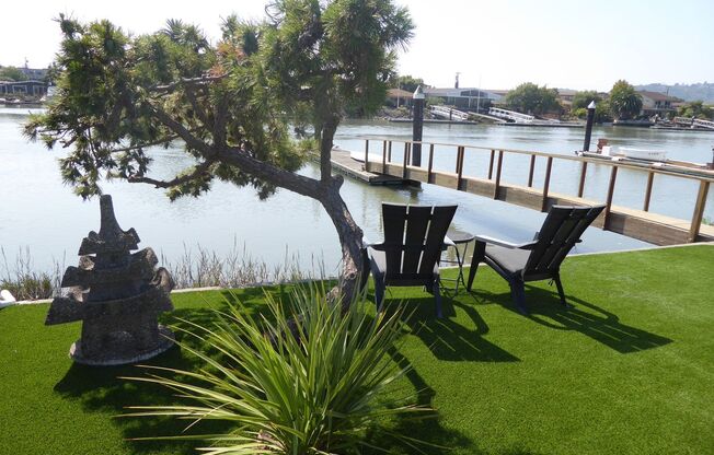 RARELY AVAILABLE TWO BEDROOM TWO BATH ONE LEVEL PORTO BELLO CONDO HOME ON THE WATER WITH DOCK