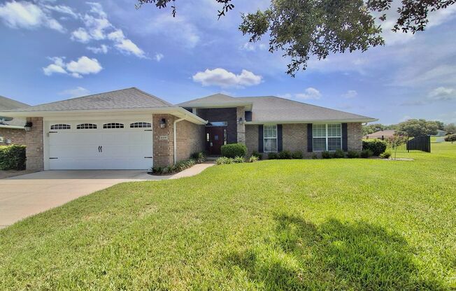 Spacious 4-Bedroom Brick Home in Preserve at Heathbrook – Pet Friendly with Fenced Yard!