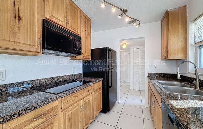 9893 47 AVE N