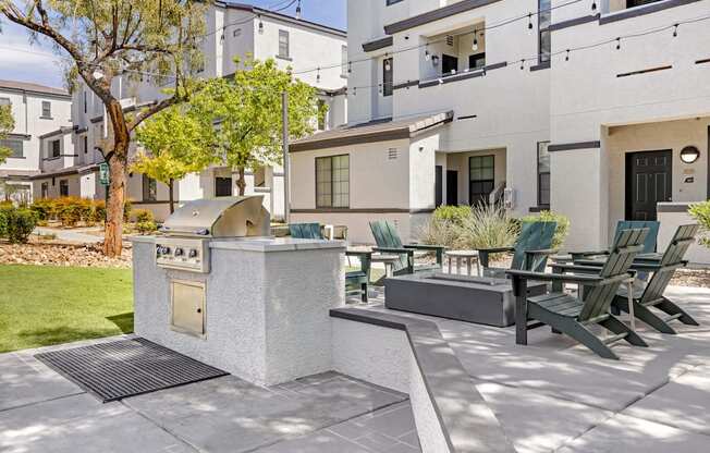 Grill, chill, and unwind in style at the Michael B apartment complex's inviting outdoor patio, where good times and great food come together seamlessly.at The Michael B Townhomes and Flats, Las Vegas,