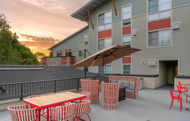 our apartments have a large patio with tables and chairs at Delano, Redmond Washington