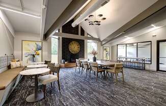 seating and dining areas in the clubhouse at The Bennington Apartments