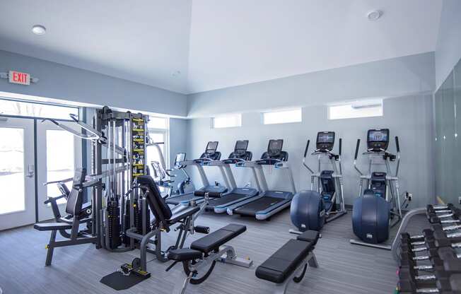 Spacious Fitness Center with Cardio and Strength Training Equipment