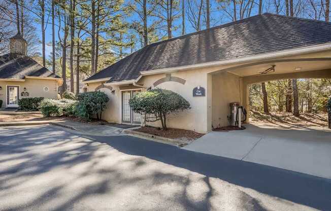 A house with a driveway in front of it.