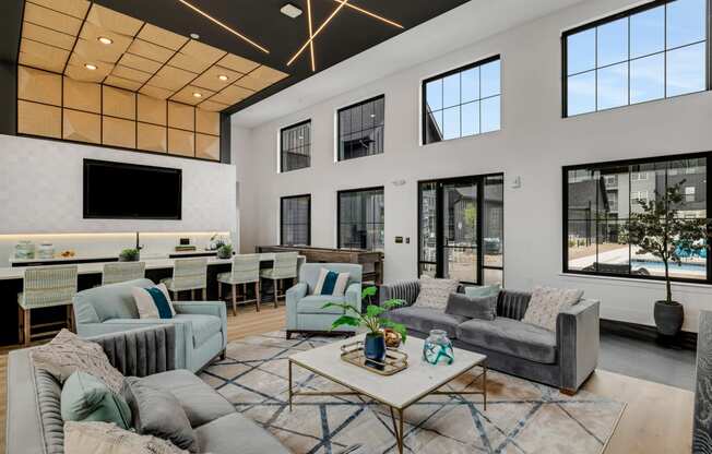 a living room filled with furniture and a large window at Prism at Diamond Ridge, Moon Township, Pennsylvania