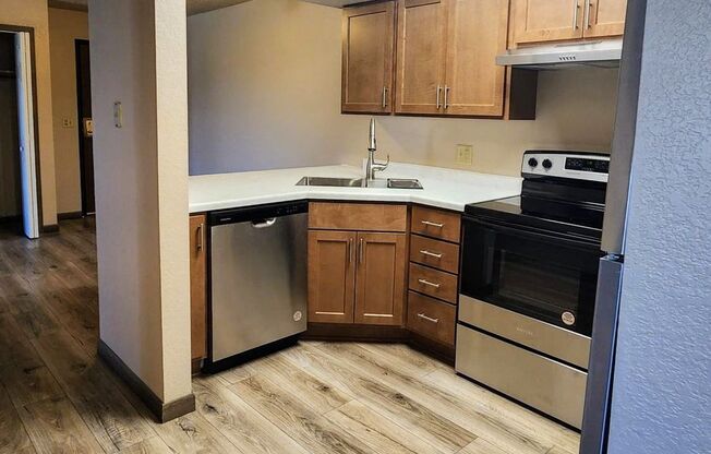 Large 2 bedroom 1 bath, updated Apartment, with Huge Balcony! Garages available!
