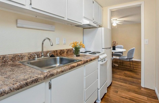 Prepare meals with ease in kitchens equipped with contemporary appliances, ample cabinetry, and functional layouts.