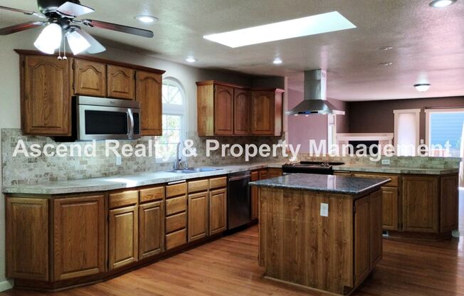 Spacious One Level Open Floor Plan with Large Kitchen, Central AC, Oversize Deck & Garden Containers Corner Lot